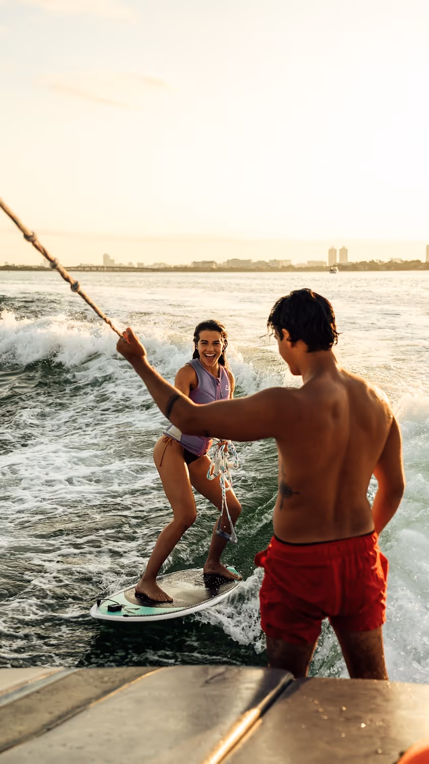 Couple wakeboarding