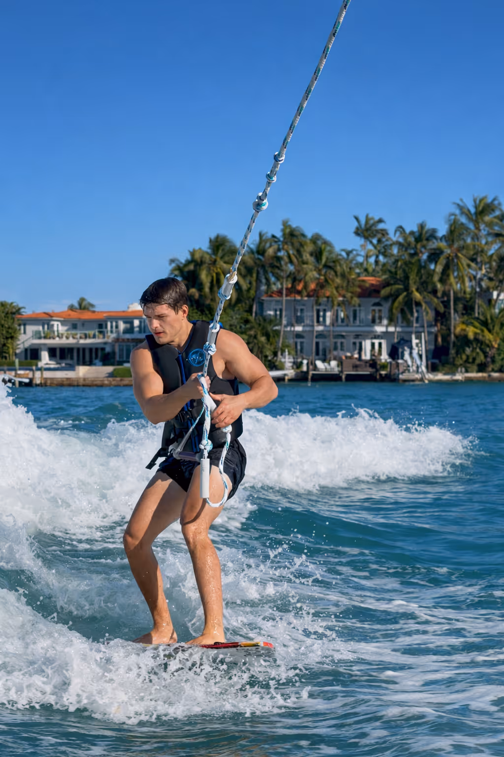 Wakeboarding in turquoise water