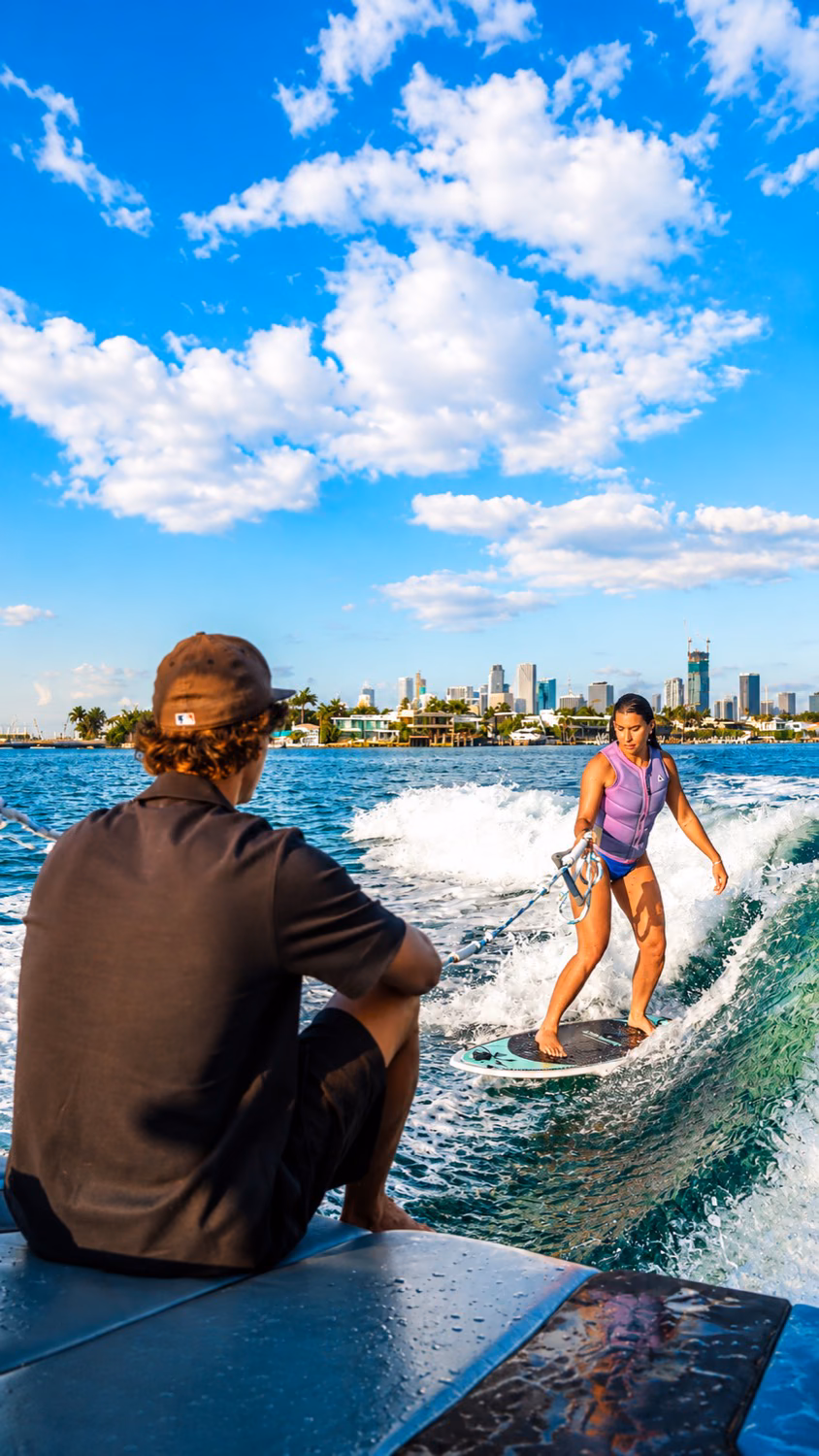 Wakesurfing with the downtown skyline behind