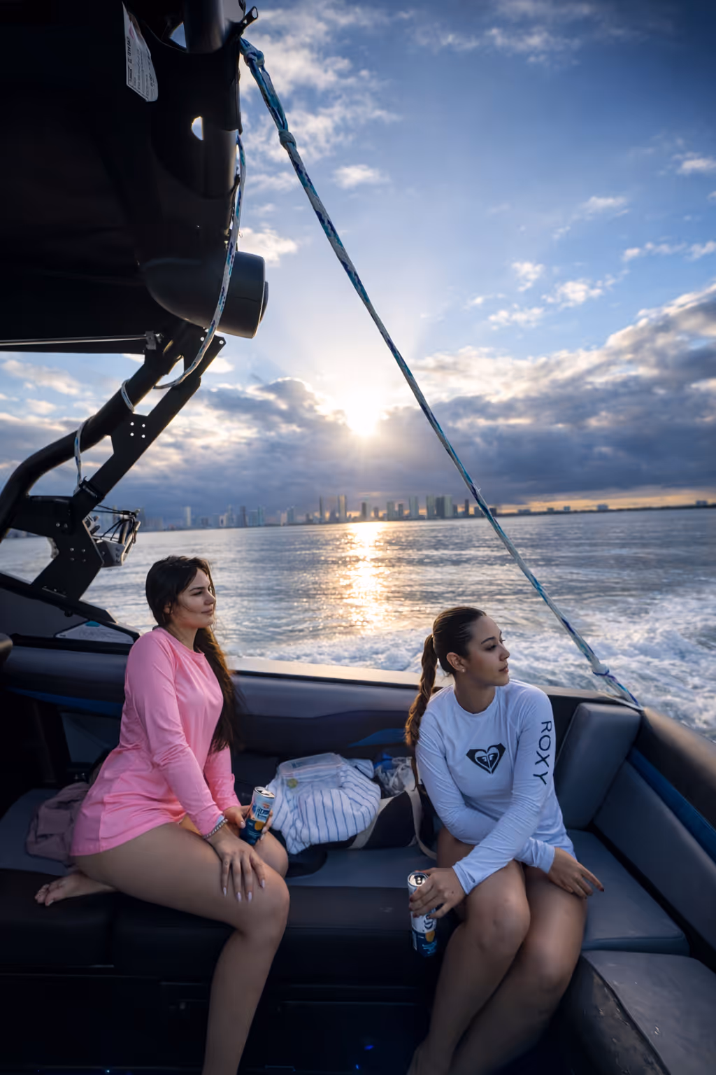 Wake boat cruising out toward the surf spot